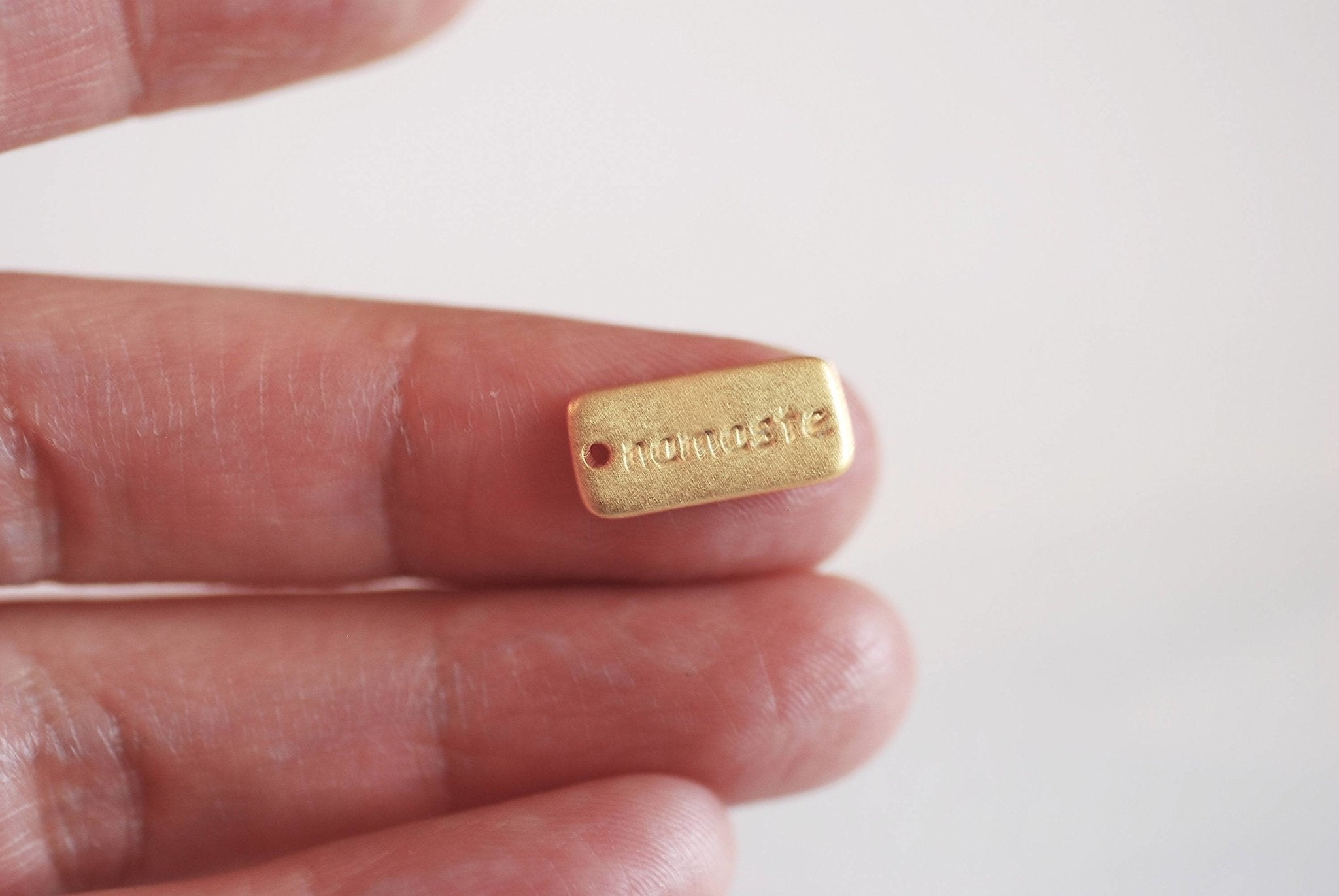 Namaste Charm- 22k Gold plated over 925 Sterling Silver, Namaste Tag, Words Inscribed, Yoga Charm, Meditation Charm, Ohm Om Charm, 391 - HarperCrown