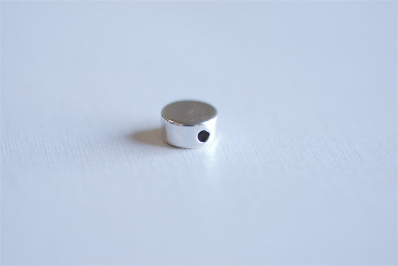 Flat silver disc shop beads