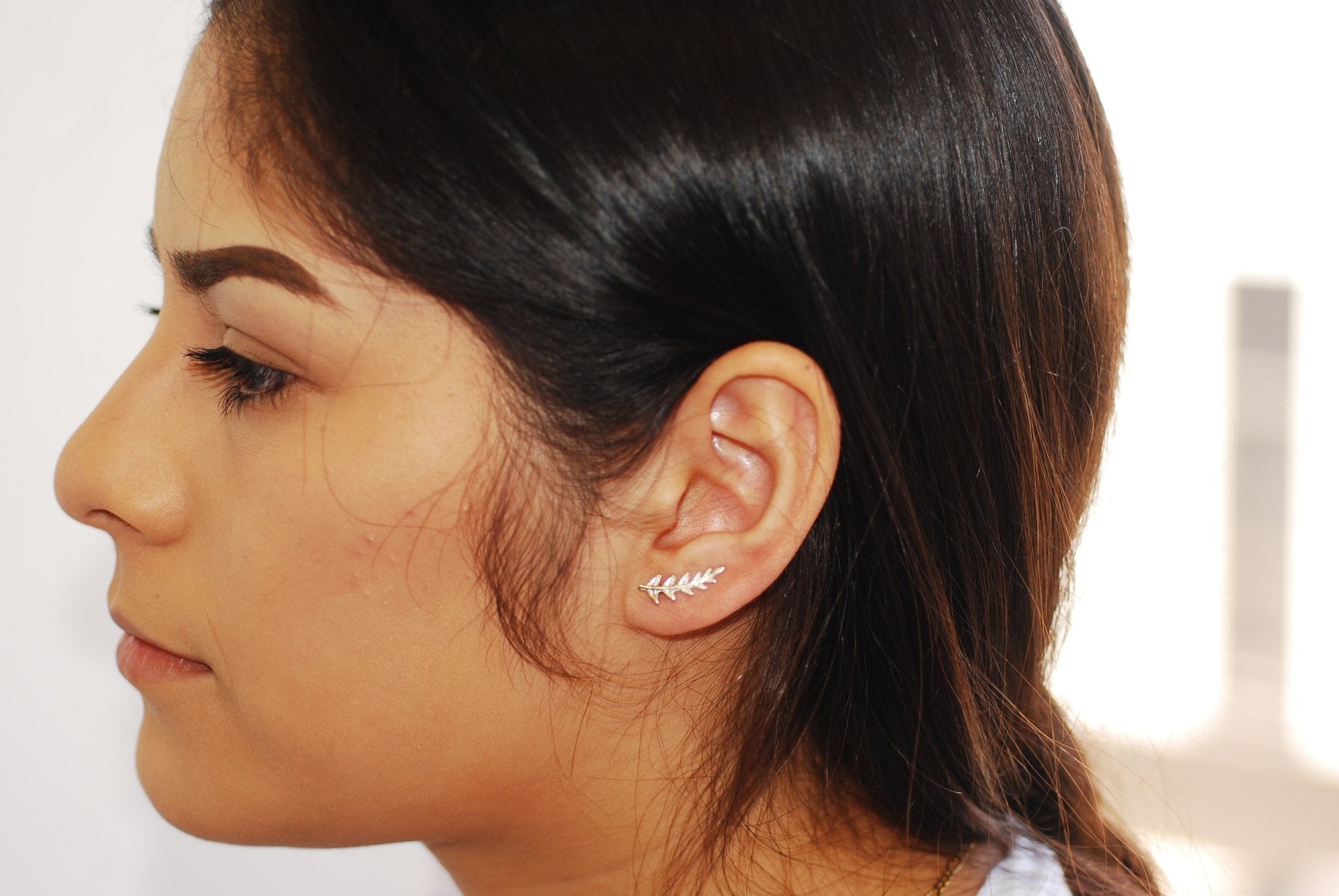 Gold ear climber 2025